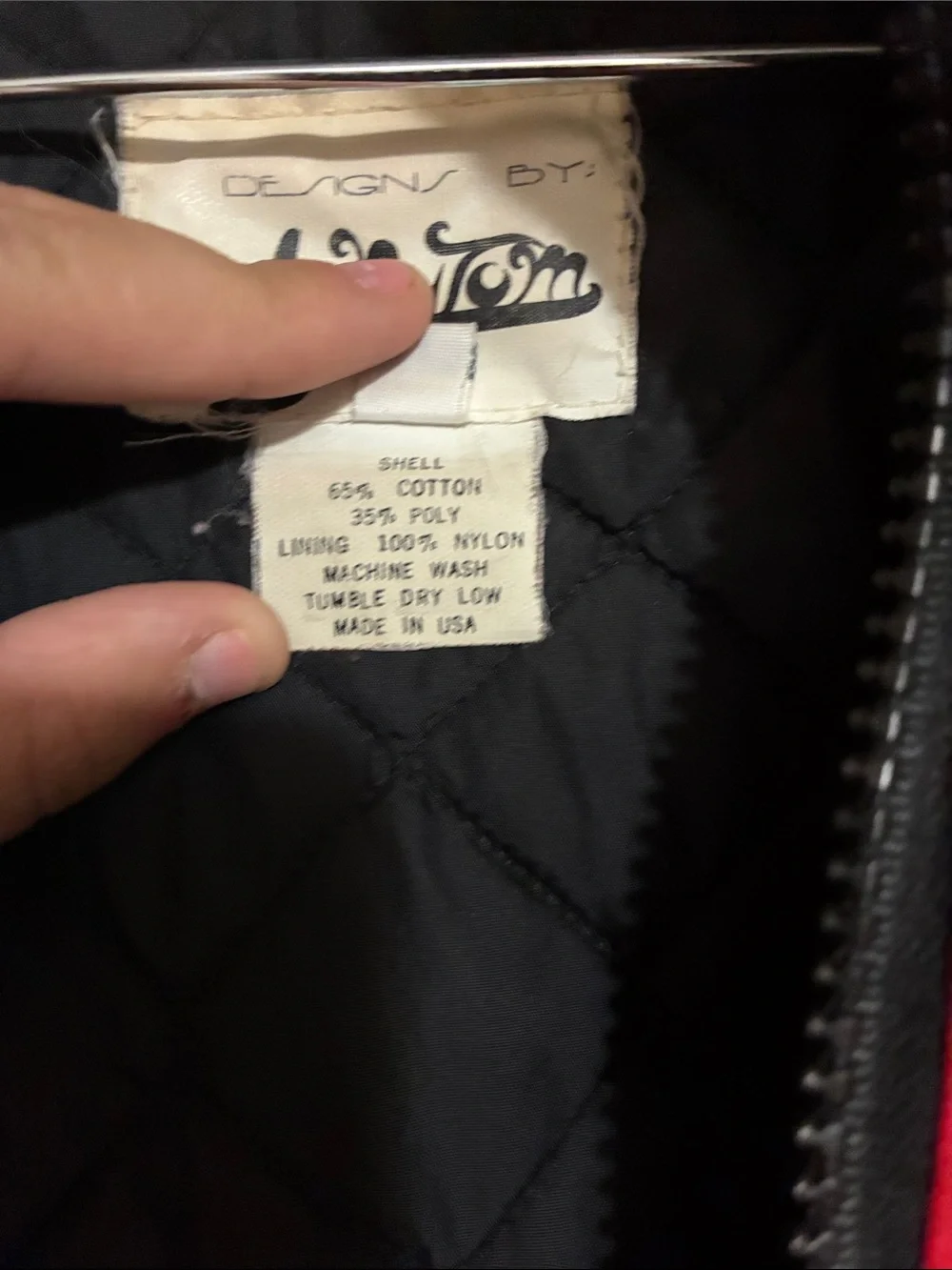 Red Puffer Jacket with Black Graphic Detailing